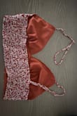 I absolutely loved this set and was so excited to wear it on vacation. Unfortunately, while I was wearing it during my vacation, one of the straps suddenly snapped and broke.
It was very disappointing because I genuinely loved the outfit and had been looking forward to wearing it. The design is gorgeous, but the strap did not seem durable enough to withstand normal wear. - Sharon M.