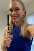 The dress is lovely. I had the opportunity to wear it for a professional engagement (concerto performance; professional flute player) and received so many compliments. It fits on the tighter side, but that is how I prefer my garments to be. Absolutely looking forward to wearing it again!! - Kathryn F.