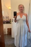 Great color and light linen but not see-through. No bra required. Perfect for a wine festival or beach location. Fits a little bit loose, but good in the heat and the straps allow you to tighten and bring it in a bit. Would definitely buy again! - Kimberly A.