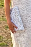 This bag is beautiful! The beading is so pretty and it is a great size! I was able to fit more than enough items in it. I love that it comes with a strap, if needed! - Brittany J.