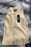 It's super frustrating when you get defective merchandise even if purchased on sale. It fits, it's cute, BUT it's missing a button. Would love an exchange and easy way to navigate the site so I could contact customer service (or have it as an option) instead of just a review or exchange on poshmark option. - Diana M.