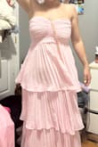 Honestly, I read a lot of the reviews about this dress and many people said this dress runs small. It does, in fact, run very small - I am someone who wears a size XS & I ordered the dress in a Medium. Thankfully, with assistance, I was able to zip up the dress. The zipper is a bit finicky, and again, if you have a larger chest, it's a gamble bc it was very snug with no give. The dress, overall, aside from the top part is very pretty/flowy & I love the color. If you really read the reviews in depth, I would recommend ordering the dress! I am wearing it for a friend's wedding as a bridesmaid. If you're looking to order this dress, my suggestion would be to order 2 sizes up if you have a larger chest and follow the bust guide over the waist and other measurements. - Kimberly L.