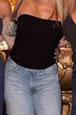 Love this top. Got a lot of compliments. I originally ordered a small but exchanged for a medium for a more comfortable fit. I think it's pretty true to size, especially with the back being adjustable, but I think it was just my preference. I could've gotten away with a small - Emily G.