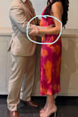 The dress was beautiful and the perfect length for a summer wedding. My only complaint is that there is a bit of extra fabric around the waist that pokes out, making me look bigger than I am. - Briana A.