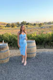 I was a little worried after reading the reviews that it was going to be too small, but it fit perfectly! The chest area was perfect for me, and my wider hips fit in the dress nicely. - Amber D.