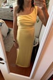 I love the warm yellow color of this dress. The structure and shape of the dress is flattering. It may be better suited for smaller busts. The only tricky part is that it requires skin tone undergarments due to the light color. It is lined but shows underwear lines easily. Searching for the best no show underwear. I used nipple covers that work perfectly. Can't wait to see how it photographs! - Nicole S.