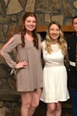 I wore this to my sorority sisters wedding and it fit just fine! I'm either a small or medium and I got a medium. It does show the outline pretty easily of anything you wear underneath. But soft material. - Caylin C.