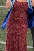 I loved this dress! Zipped it up, and it was so comfortable. Felt just a bit loose, but that is just because I expected the dress to fit corset-style. The dress does have boning, but it does not give much structure. I am a true "M" size, so if you are too and want it to be tight, then an "S" size could also fit great. Prettiest skirt! - Anne M.