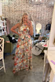 This dress is absolutely stunning! I wore it as the sister of the groom at a wedding. The dress is a little long, so anyone under 5'7 would definitely need to get it hemmed. I am right at 5'6, and when wearing 3.5-inch heels is still skimmed the floor. Without heels, I was stepping on it. Other than that is was perfect, and the neckline is so flattering. - Trinity L.