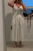 In my opinion, it felt and looked like I was wearing bedsheets. Very heavy. Material wrinkles easily. - Tara A.