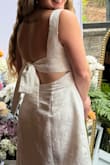 I bought this for my bridal shower. The florals were super cute for wedding vibes. I'm usually a small or medium, and I'm glad I went with the medium. Everyone said I looked stunning, and I agree! Love love. - Tara A.