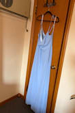 Loved the powder blue color of the dress, but the straps are incorporated into the corset, so there really isn't much holding up your chest. This might be fine for slimmer or smaller breasted ladies, but I have a C cup, and there really isn't a way to wear a bra with this dress. This type of material also holds odor, so I knew I wouldn't want to wear it for dancing all night. - Cristina G.