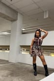 I absolutely love this little dress! I saw someone else comment on the tightness of the neck, and I do agree with that, but I just stretched the threads out a bit, and we were in business! It's the perfect mix of sexy, understated AND bold! Love it. - JAMILAH W.
