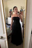 So I bought a few dress options for a wedding where I'm a bridesmaid and we can pick the style. Strapless was a bit of a gamble for me personally, and honestly that wasn't an issue. It held up well with the fabric rubber type lining on top. It was the fit in the torso with the drop waist. It ran MUCH more snug than I imagined, and the drop waist kept riding up, and I was just standing there posing for pics. I also have a pretty defined waistline and it made me look wider than I am. I ended up returning it. I think this style and design would work much better on a very slim person who doesn't have as wide of hips as I do. - Madison P.