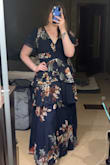 I bought this dress for a wedding in the woods but ended up returning it because it was pretty heavy with a lot of material and thought I would get too hot. The dress is beautiful and great for a summer/spring look but is definitely more of an indoor ac dress. It did run a bit tight around my waist but otherwise fit very well. I usually wear a size 12 and a large/XL but did size up because my shoulders are a bit broad. - Amanda F.
