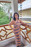 I absolutely love this dress! The colors are even more beautiful in person and give it such a fun, tropical vibe. The halter neckline is very flattering, and the knit fabric is lightweight, breathable, and comfortable for warm weather. It hugs in all the right places without feeling too tight and drapes beautifully. I wore it on vacation and received so many compliments. It's perfect for the beach, a sunset dinner, or a resort getaway. Pair it with sandals and statement earrings for an effortlessly chic look. Definitely one of my favorite summer purchases! - Miriam S.