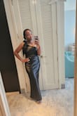 Very nice dress, good material. Fits true to size, I wore a medium. Only downside was I felt the side without the bow was slipping, but some tape would've kept it in place. No complaints other than that, it looked more expensive than what I paid. - Brittany B.