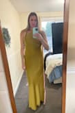 It is too tight and cannot be zipped in the back. - Kimberly C.