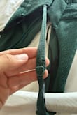 The dress itself looks nice, it is very long for my height 5'3 and would need to be hemmed. The biggest issue is the straps were attached twisted the wrong way and there's no way to 'untwist' unless I get it altered. - Alejandra V.