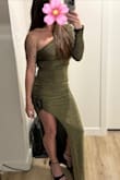 Great dress; the material is very stretchy and forgiving. I usually wear XS, but when it arrived, it was too big, so I exchanged it for the XXS, and it's perfect. Definitely suggest sizing down 1 size! - Lauren V.
