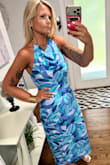 I normally wear medium dresses, but a medium was much too snug in my upper back and although it closed, it was a struggle and felt extremely uncomfortable. Since I loved the dress so much otherwise, I ordered the large and am so glad I did! It's super comfy and flattering! The color looks great with a tan! - Marta S.