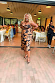 It fit great. I wanted something comfortable, but beautiful and I got that with this dress. I even felt sexy in it! You will need help fastening it, but it's easy to zip and the straps are adjustable. If you are chest heavy, the top is very loose and it is easy to have a slip. - Ashleigh O.