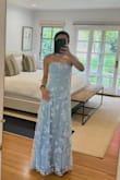 I usually wear an XXS, but based on the reviews, I ordered an XS, and I'm glad I did. The chest area is slightly loose, but the ribcage fits snugly, so an XXS would have been too tight. The length is perfect with very high heels, about 4.5 inches, so I won't need to have it hemmed. - Jennie T.