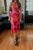 I absolutely love this dress - the bright colors, the material, and the fit. Sadly after wearing this dress for one night out the button already broke and the other button looks quite loose. :( Disappointed in this. - Emma O.