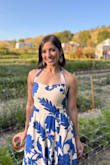 Got many compliments on this dress, and I absolutely love it! It's a little tight, but I also ordered an XS, so it's supposed to be on the tighter side. Love the opening on the leg and the way it fits around the shoulder. Highly recommended! - Virginia D.