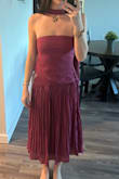 I wanted to love this, but unfortunately the fabric on the stomach is much looser than the rest of the fabric and is very unflattering. The color is a bit darker and more muted than it shows online, in my opinion (not that I don't like the color). It's more purple-y in person. This also does run small. I'm an XS at most places, so that's what I ordered, but I couldn't even take a deep breath in this because it was so tight. - Mallory I.