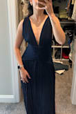 Very beautiful dress, but the medium felt very big! I'm usually a 4/6 and can fit in a small or a medium. I bought a medium because some smalls are too snug and I wanted to make sure it would work! Ended up being too big. - Camila V.