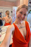 This dress is super duper DUPER orange. It's not a good fit for my skin shade (pale) but my husband loved it too much for me to return it. Looks sexy, fits okay. - Lisa D.