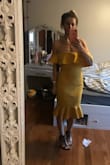 This dress you have to buy. Size up, as it does run small. I ordered one size bigger and fit perfectly. I love the color of this dress. - Julita O.