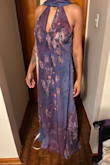 I fell in love with the advertisement, but the dress I received looks nothing like what is pictured. The print and fabric look and feel much cheaper in person. The color is very dull throughout and has more dusky blue than the vibrant purples expected. I know some variation can be normal, but this is just totally off. The fit is also incredibly weird. I sized down based on reviews, and it's still very baggy in an unflattering way. I wanted to like it so much, but it's just a no. It could be cute, but it is just not what is advertised. - Alice A.