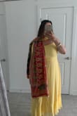 I love this dress. The frill details at the bottom and the shoulders tie straps make it very unique. It was comfortable to move in and was flattering. - Emily F.