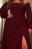 I LOVE HER. I also have this dress in green. It's the best. It's so flattering. - Grace P.