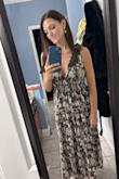 The colors on this dress are perfect for Fall! The bows on the shoulder are sewn together so there's no hassle with keeping them tied. Even though it's low cut, it clings to your chest for a more modest look. Love it so so much! - Heather C.