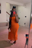 I really was on the fence about this dress from ready the reviews& However since it was on sale I said perfect time to buy it. Only thing I didn't like was the midsection looks like I have an undergarment on and I did.. Its just the way the dress scrunch up & the color orange was everything. I plan on ordering the pink or blue. - Dawn M.