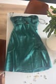 Too much filtering; you think you would get this bright green dress when you get a regular dark green one - Makenna R.