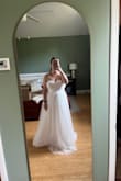 Bought this with a few other options. I thought it was pretty (lace detail under the tulle was a nice touch), but the proportions just seemed weird. The torso seemed really short, and the top was not at all flattering (made me seem a lot wider because of where the waist fell). Maybe I just don't have the right body type for this style. - Stephanie R.