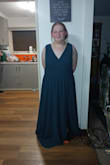 I ordered it in a size bigger than what I needed and got it taken in, so I would say the sizing is perfect. The only fault is the slit looks way higher in the photos than it is in person. - Zara C.