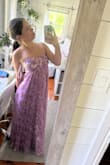 Overall I love it, but the moment I started wearing it at the wedding the fabric under my armpits ripped. It wasn't that noticeable, but it still happened and I barely did anything. - Phoebe Z.