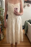 I love the look of this dress however the sizing seems off to me. The medium was way too big around the chest and torso. There was way too much space around the waist. Hopefully sizing down does the trick! - Lyla I.