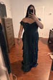 I could probably sized down but overall it's very flattering.
It comes with a silicone tape on the top part so it won't slip off and I really like that. - Diana S.