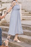 Wore this for my engagement photo shoot. We went for a more casual look and this paired great with my husband's western style. Hard to wear a bra underneath, but you'll want something - there's no support. 
Work hard at getting the wrinkles out with a steamer; they're tough with this fabric. Could be super cute for a baby shower too. - Shaye M.
