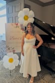 I wore this dress for my bridal shower, and it was perfect! It was so flattering, and I got so many compliments. It's been a few months, and people still bring up how much they loved that dress. I did have to get the side taken in at the bust area at a nearby cleaners, but that was not a big deal for me. I find it very difficult to find flattering dresses for my figure, and this was the most flattering dress I've ever worn. For the price, it's very well made and beautiful fabric. - Bari S.