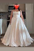 This dress is so pretty! It fits fairly well since it's a corset back, but I decided to add a petticoat to it which makes it a little bit difficult for the zipper over my backside to zip all the way. Even with an added petticoat and heels on, the dress is a little bit too long, so I will get it hemmed. Overall, it's a great dress for an unbeatable price!
The attached picture is the dress with an added petticoat. - Katie S.