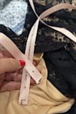 I was really disappointed with this dress, especially considering the price. The plastic packaging it arrived in looked like it had already been opened, and when I took the dress out, the pink security tape appeared to have been tampered with as well. That immediately made me question whether I had received a previously opened or returned item.

The quality of the material was also very disappointing. It felt cheaply made and definitely not what I would expect from a dress that costs around $100.

Unfortunately, I didn't have enough time to return it and order a replacement because my event was only a few days after it arrived. Instead, I purchased a $40 dress from Amazon, and I received compliments on it all night.

Im now hoping I dont have any issues returning this dress since the security tape appeared to be tampered with before I even opened the package. Overall, I expected much better quality and packaging for the price and was very disappointed. - Michelle R.