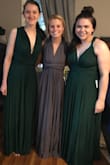 I bought this dress for my 5 bridesmaids. It fit everyone great! We are all different shapes(some small chested, some large) and we loved it. Originally I ordered taupe, green, and dark grey, but in the end I am returning the taupe and ordering more green since we all fell in love with that color! The material is very soft and doesn't really cling. It was scary at first getting the dresses out of the bag because there is a lot of fabric!! We all ended up trying on different sizes and we could fit in any of the dresses! These are just photos of us trying them on. - Emily B.