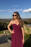 The color is even more stunning in person. It fit beautifully, and I felt so comfortable and confident throughout the party. - Brenda C.